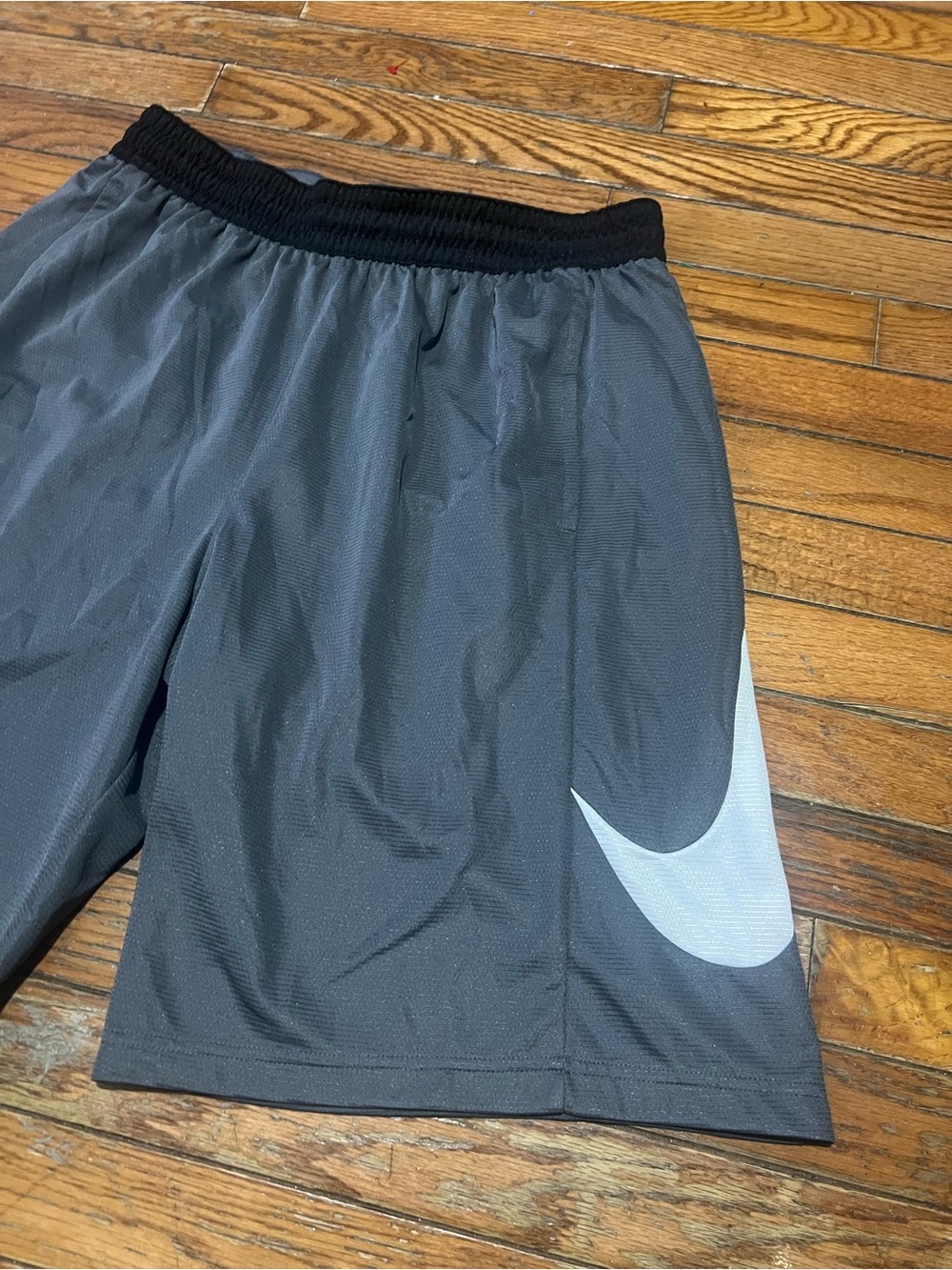 Nike Men’s Gray Athletic Mesh Shorts with White Swoosh size L